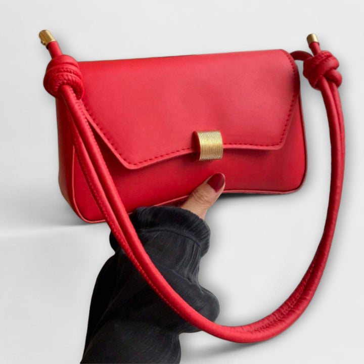 Vintage Leather Handbag with Classic Clasp Closure