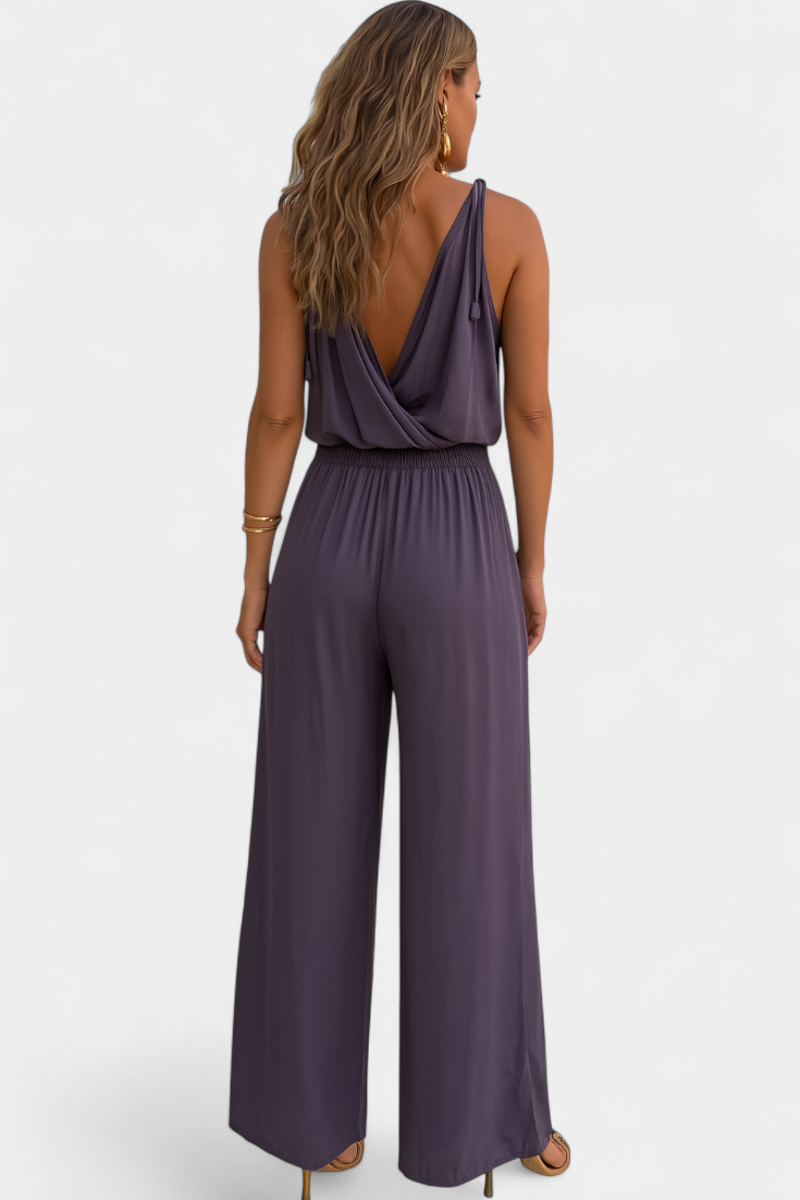 Backless Jumpsuit with Gold Accents and Crossover Neckline