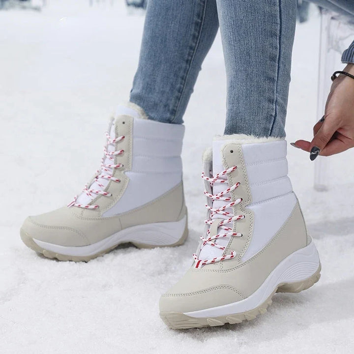 Women's Waterproof Snow Boots with Faux Fur Trim and Lace Up Detail